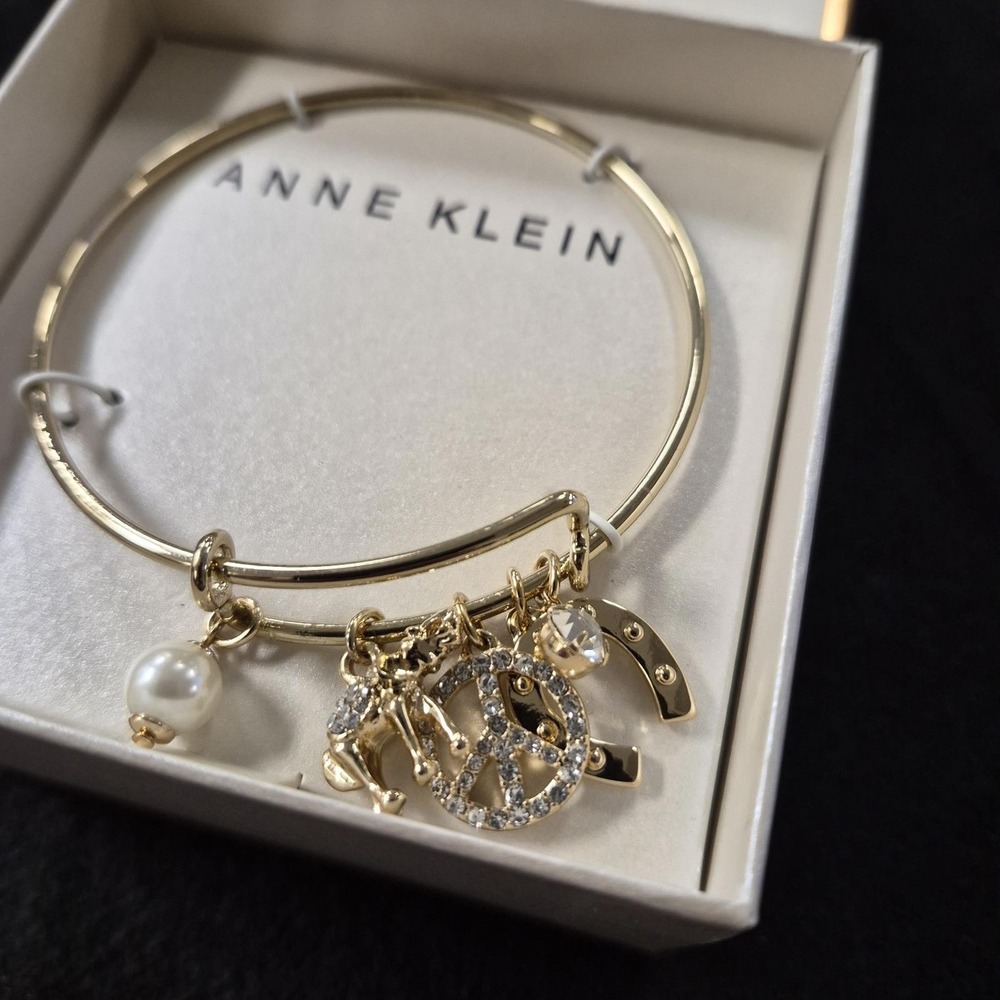Anne Klein Gold-Tone Crystal Charm Bangle Bracelet - Picture 2 of 3